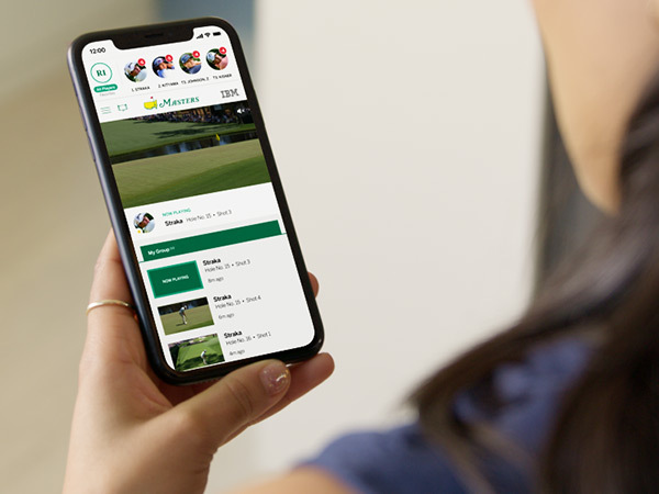 A woman is using Masters 2023 app on an iPhone. Click to enlarge.